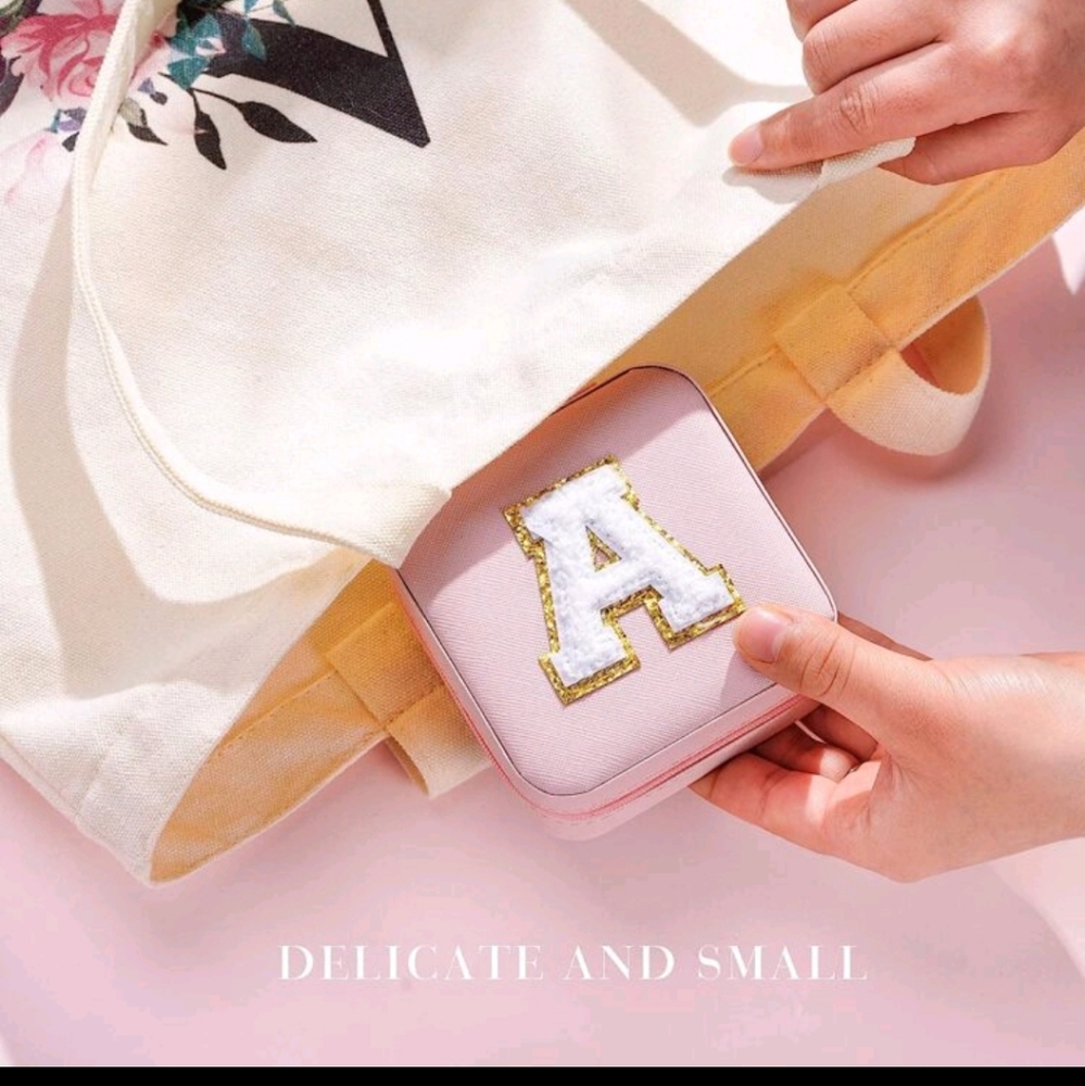 Small jewelry box with zipper. I have it in letter A and M.
